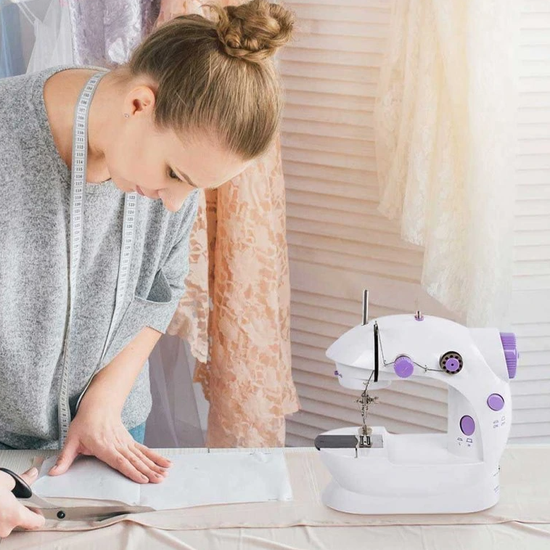 229 : Mini electric sewing machine – portable with pedal, lighting & accessories