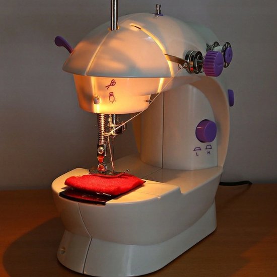 229 : Mini electric sewing machine – portable with pedal, lighting & accessories