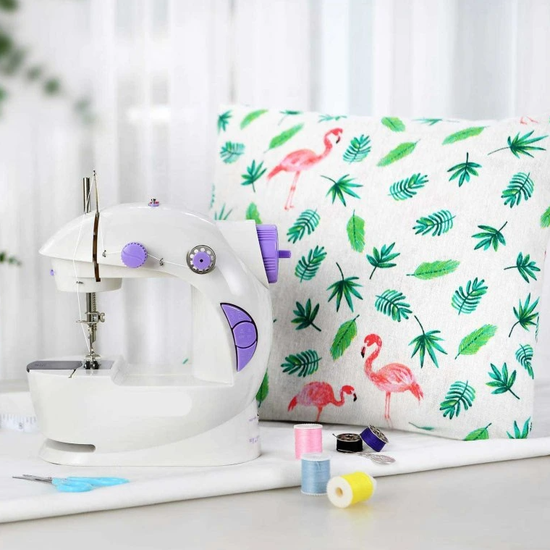 229 : Mini electric sewing machine – portable with pedal, lighting & accessories