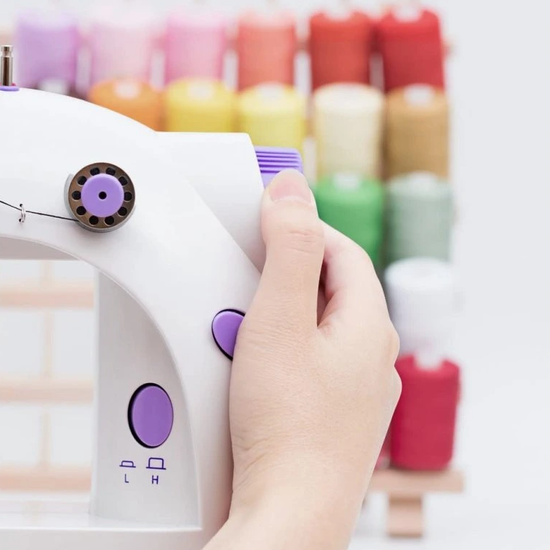 229 : Mini electric sewing machine – portable with pedal, lighting & accessories
